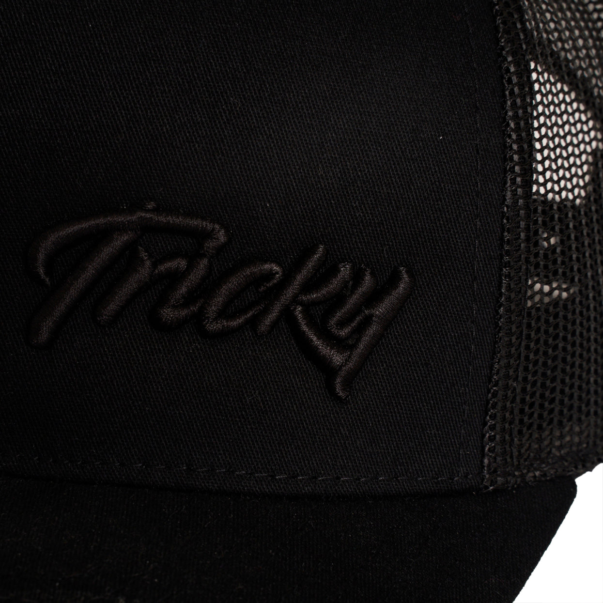 TRICKY SMALL LOGO 6 PANEL MESH TRUCKER CAP BLACK BLACK